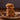 Stack of oatmeal raisin cookies on a plate with a wooden background